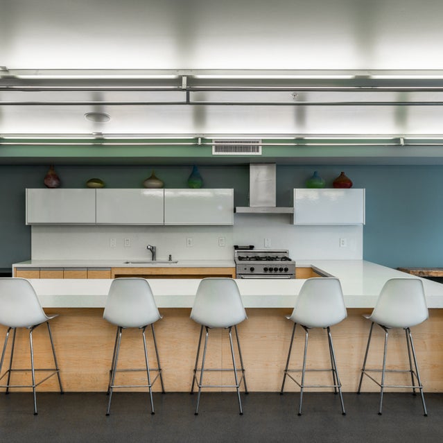 Domain Oakland Apartments - clubhouse kitchen area with counter seating