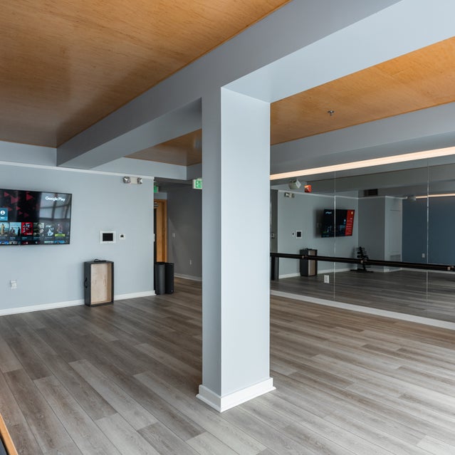 Domain Oakland Apartments - yoga studio with weights and on demand fitness